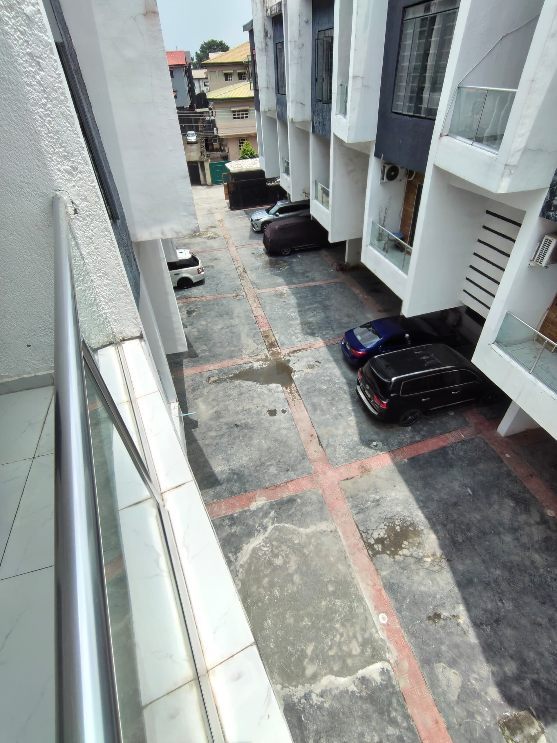 The compound and parking, from the upper balcony